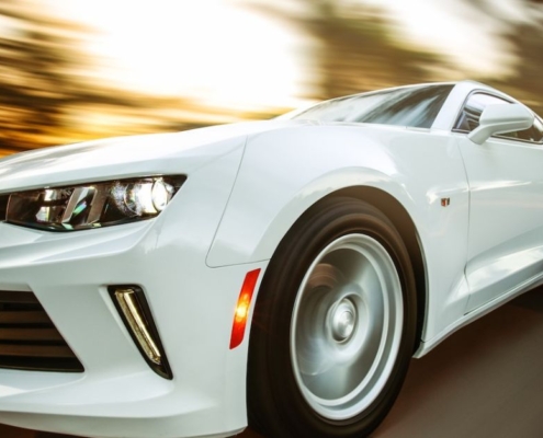 white-sport-car-driving-rocket-chip-plug-in-performance-chip