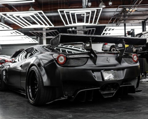 black-Ferrari-in-the-car-shop-rocket-chip-plug-in-performance-chip