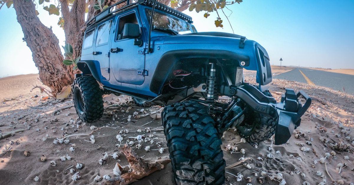 blue Jeep with upgraded suspension - rocket chip towing power