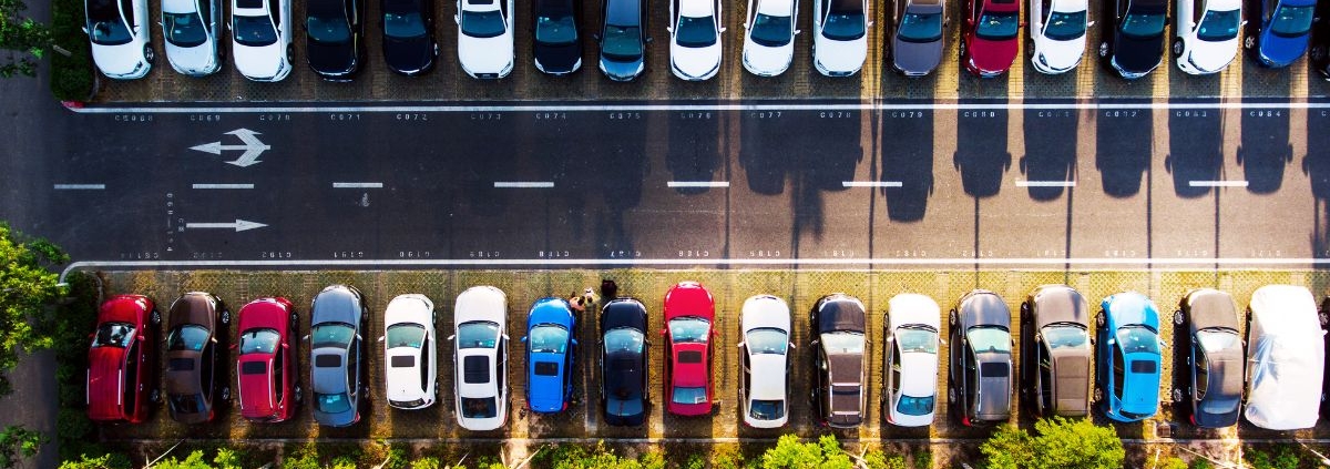 line of vehicles in a parking lot - rocket chip plug in performance chips
