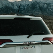RocketChip-AFM-Disablers-022820242 white GMC SUV parked near mountains at sunset - rocket chip AFM Disabler