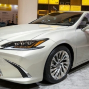 brand new white Lexus car in the showroom - rocket chip plug in performance chips