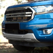 blue pickup truck but close up of front bumper - rocket chip plug in Performance Chips