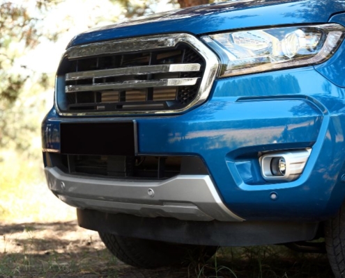 blue pickup truck but close up of front bumper - rocket chip plug in Performance Chips