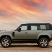 beige suv parked on a beach at sunset - rocket chip plug in Performance Chips