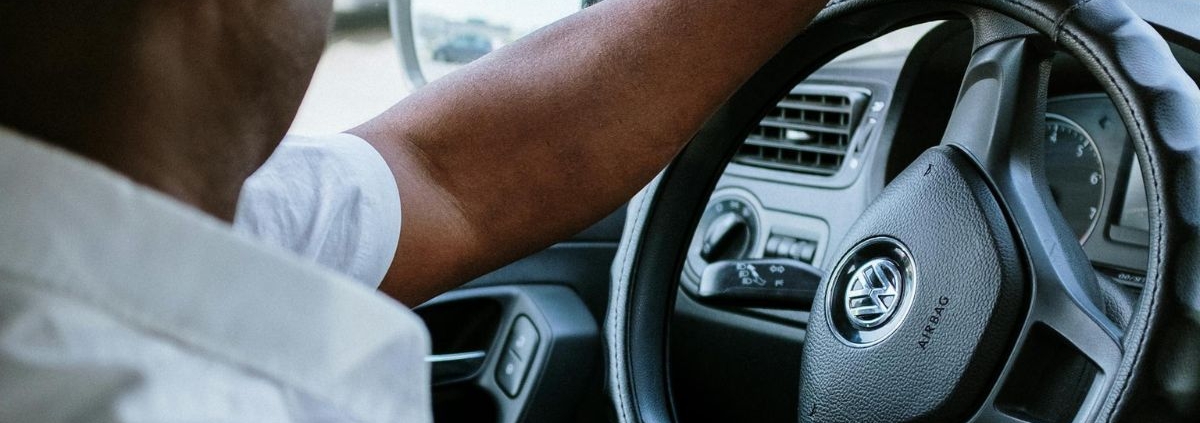 man driving Volkswagen vehicle - rocket chip Volkswagen Performance Chips