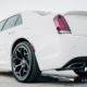 white Chrysler 300 parked with black rims - rocket chip Chrysler performance chips