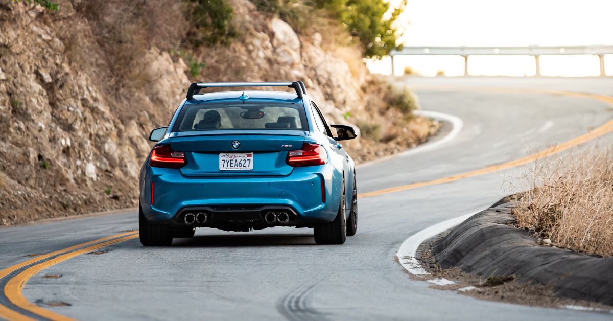 blue BMW with spoiler and California license plate - rocket chip BMW Chip Tuning