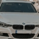 front end of a white BMW car - rocket chip BMW Chip Tuning