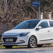 side view of a white Hyundai car - rocket chip Performance Chips