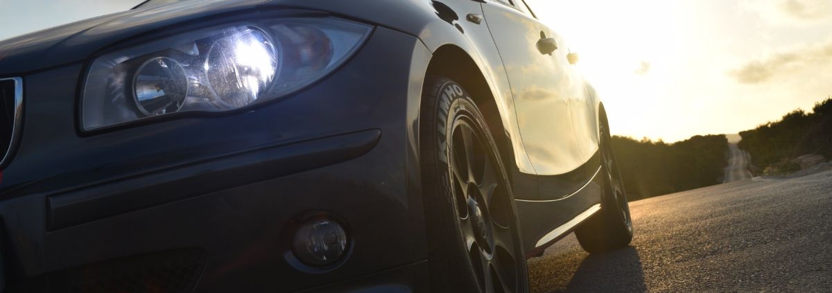 front of black car with LED headlights - rocket chip plug in performance chip