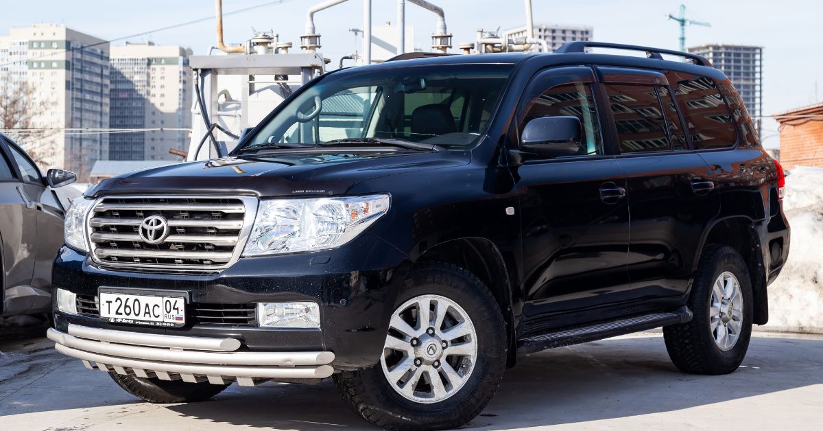 black Toyota SUV parked in a lot - rocket chip plug in performance chip