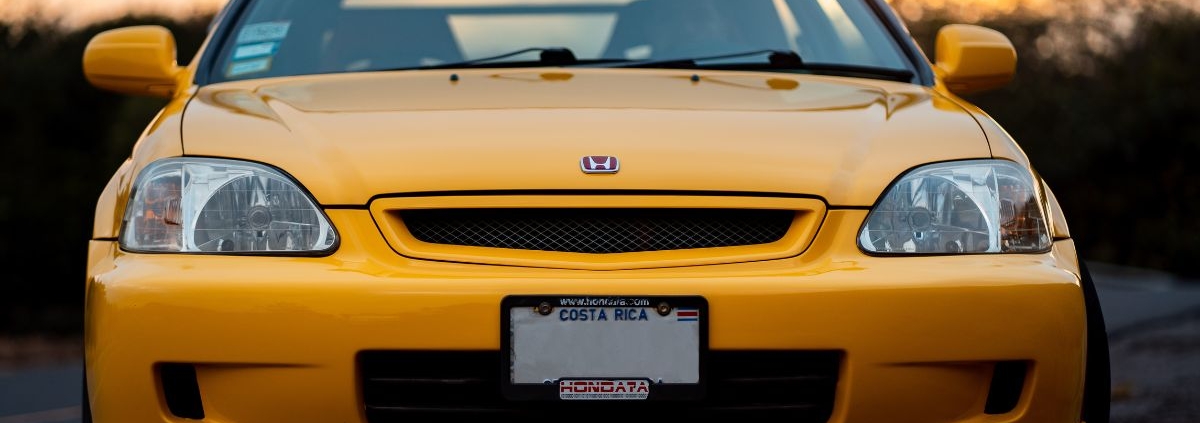 front view of yellow Honda car - rocket chip Honda performance chip