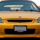 front view of yellow Honda car - rocket chip Honda performance chip