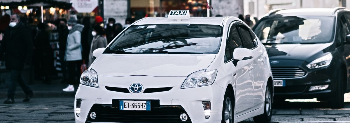 front end of a white Toyota Prius - rocket chip improving MPG