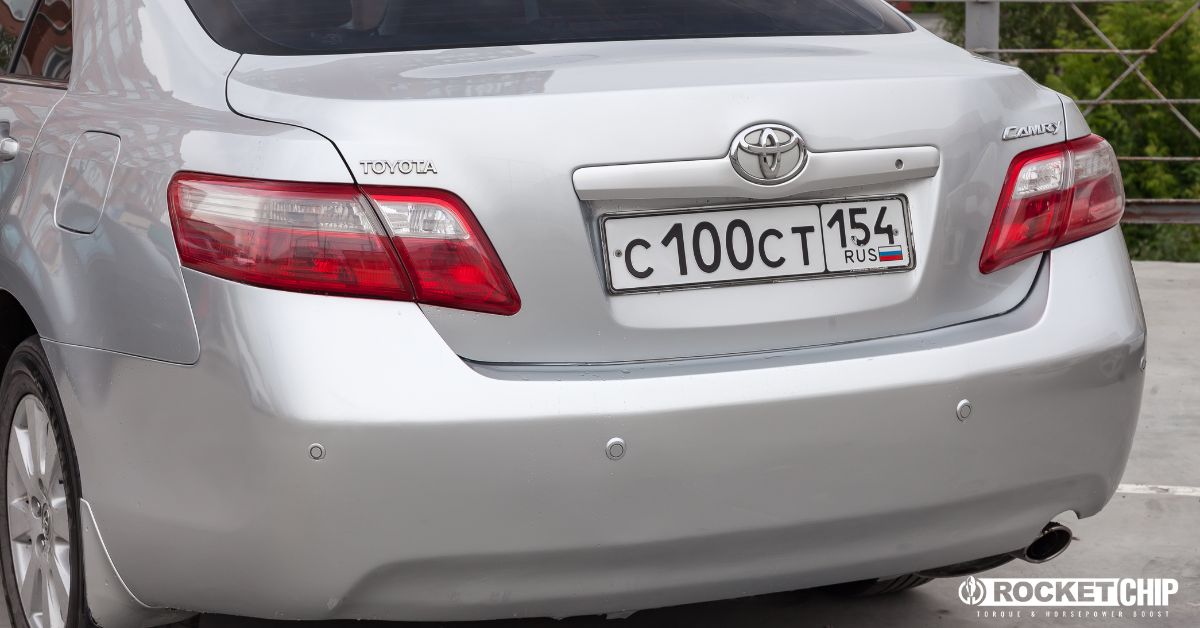 trunk of a silver Toyota Camry - rocket chip improving MPG