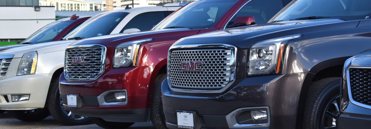 row of GMC SUVs parked together - Rocket Chip plug in performance chip