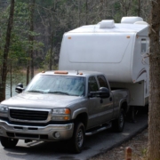 truck hauling a camper through the woods - rocket chip increasing power for towing