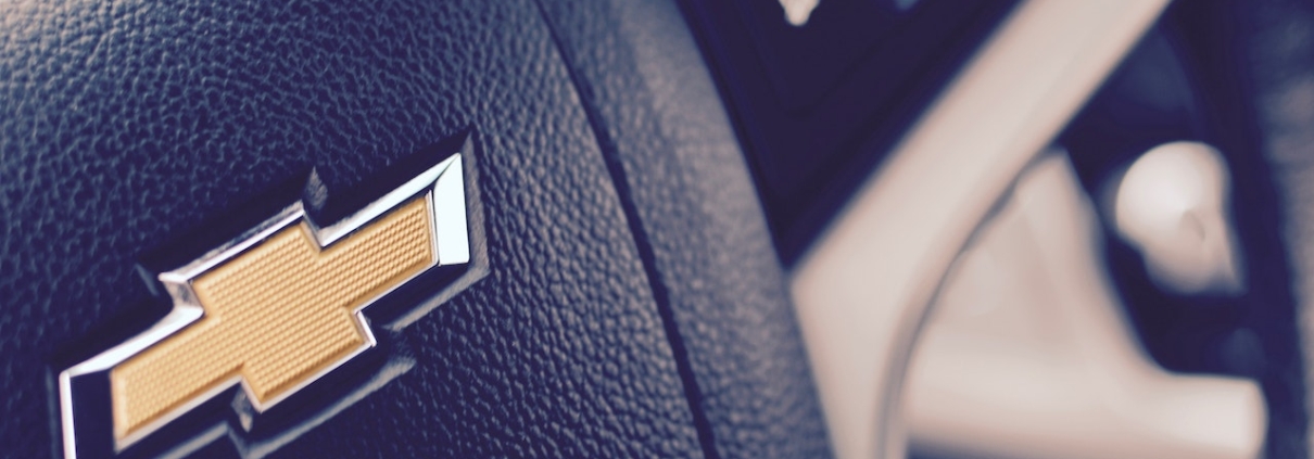 close up of a steering wheel with a Chevy logo - rocket chip AFM Disabler