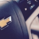 close up of a steering wheel with a Chevy logo - rocket chip AFM Disabler