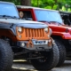 Line of Jeep Wrangler Rubicon's parked together - rocket chip plug in performance chips