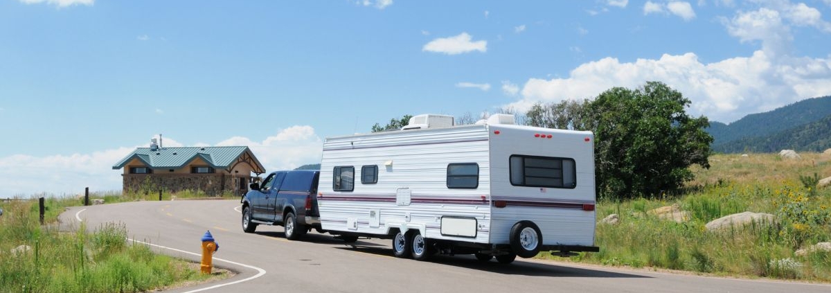 truck towing a white rv - Rocket Chip increasing power for towing