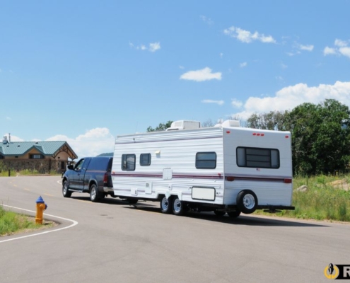 truck towing a white rv - Rocket Chip increasing power for towing