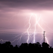 RocketChip-improving-mpg-040820251 night sky lit up with lightning strikes - Rocket Chip improving mpg