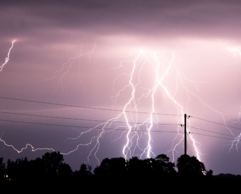 night sky lit up with lightning strikes - Rocket Chip improving mpg