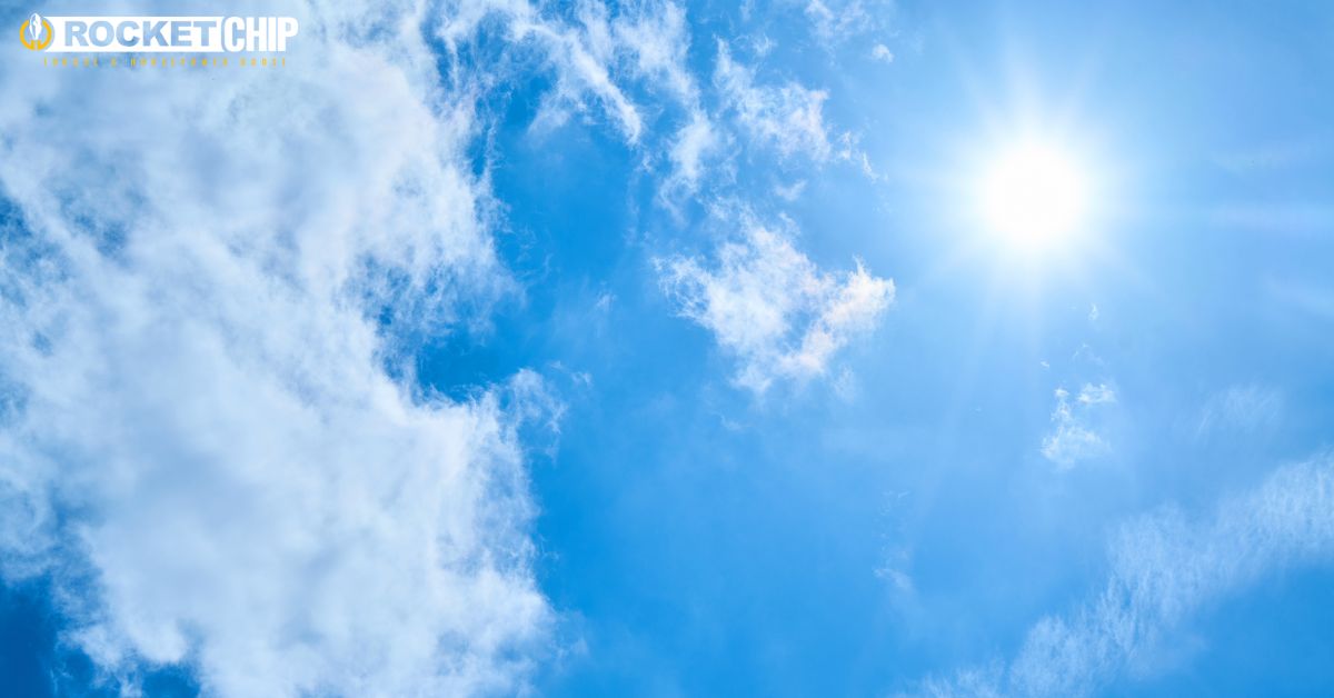 blue skies with white clouds and the sun - Rocket Chip improving mpg